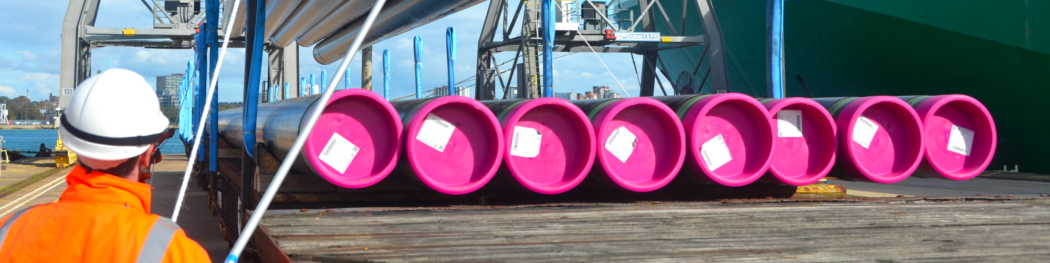 black and pink tubes in a container port